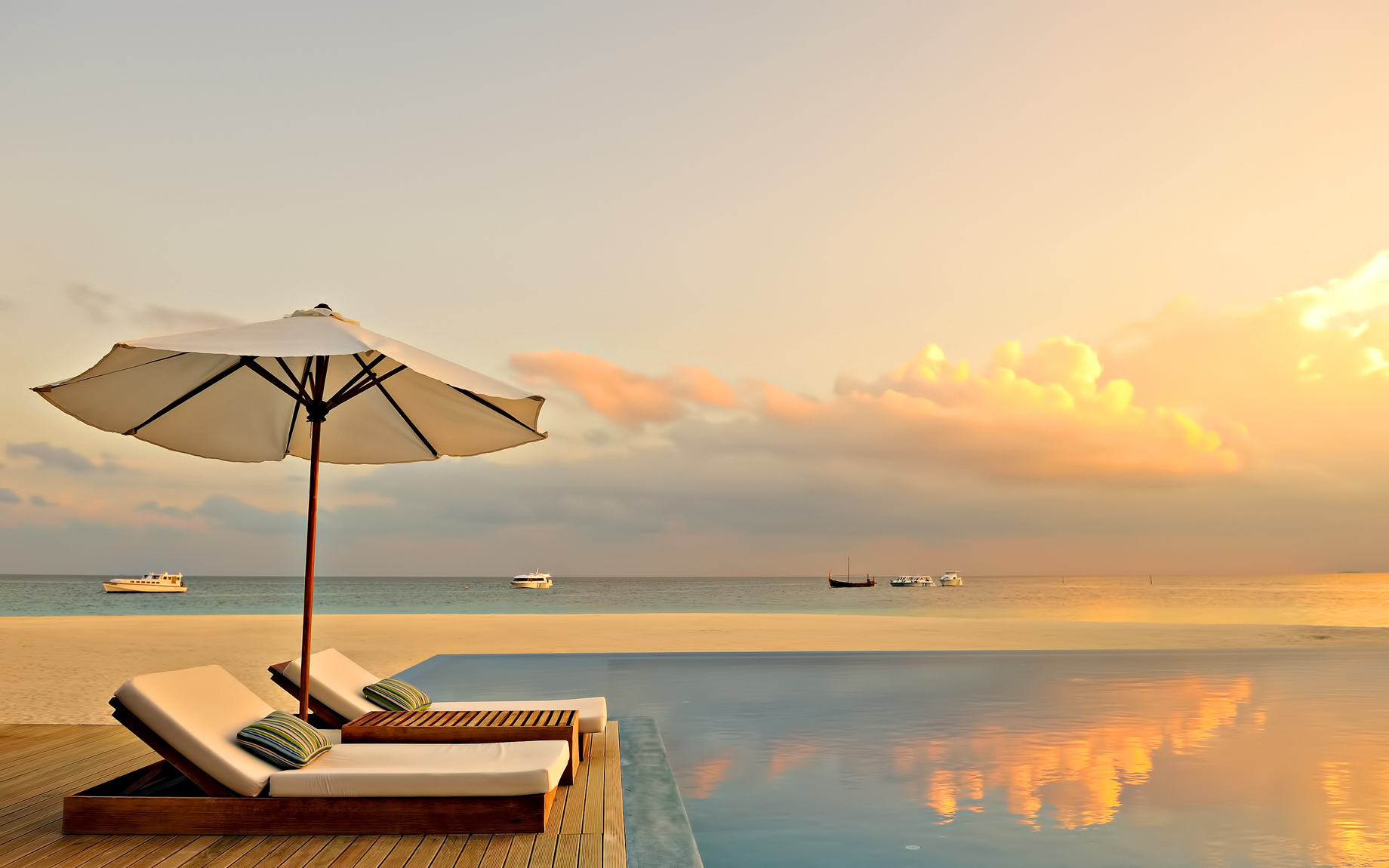 Velassaru Maldives Resort – South Male Atoll, Maldives – Infinity Pool Sunset
