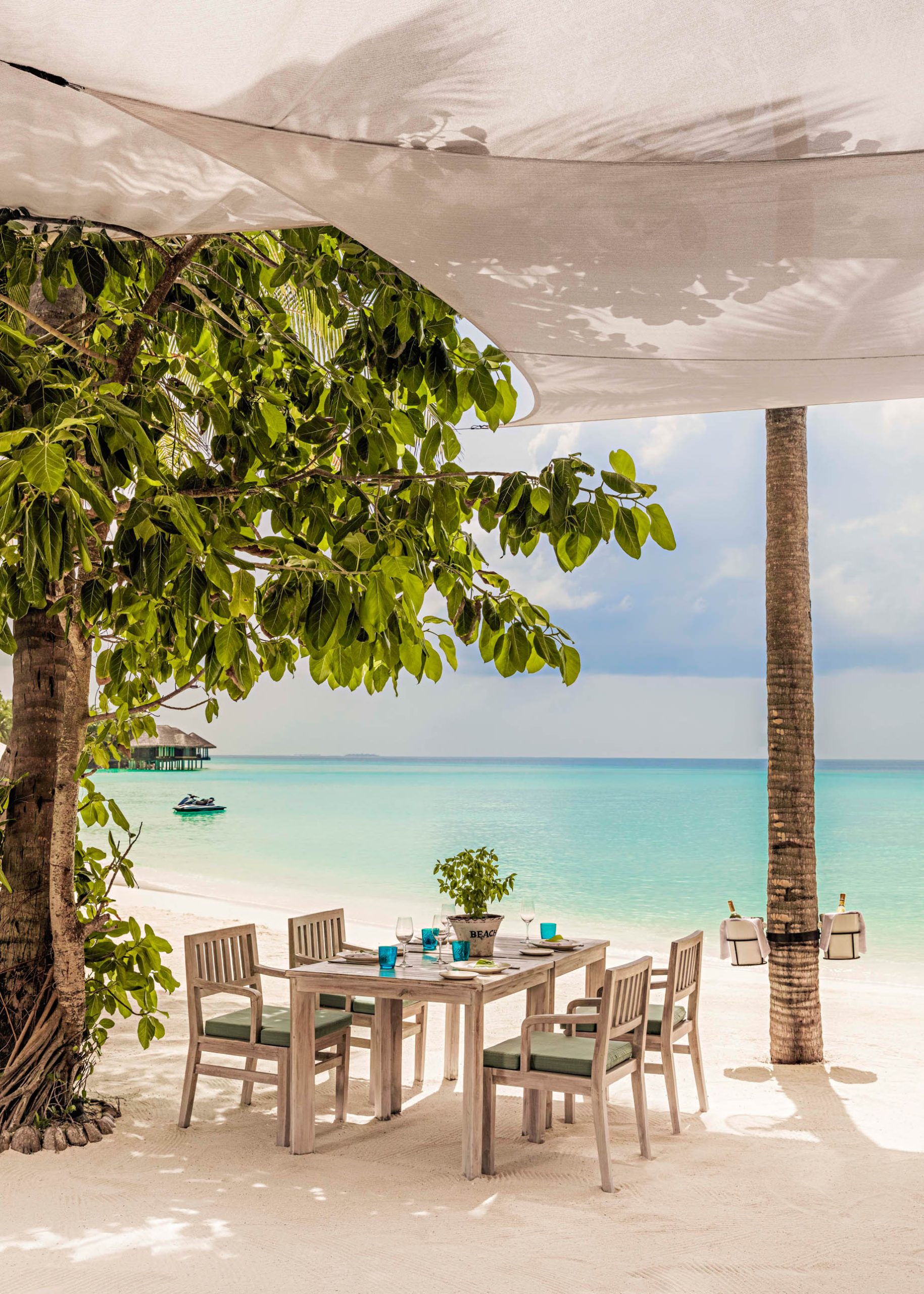 One&Only Reethi Rah Resort – North Male Atoll, Maldives – Beach Club Restaurant Oceanfront Table