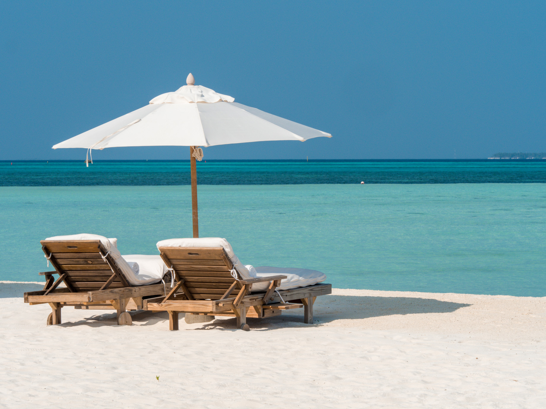 Soneva Jani Resort – Noonu Atoll, Medhufaru, Maldives – Private White Sand Beach Umbrella Chairs