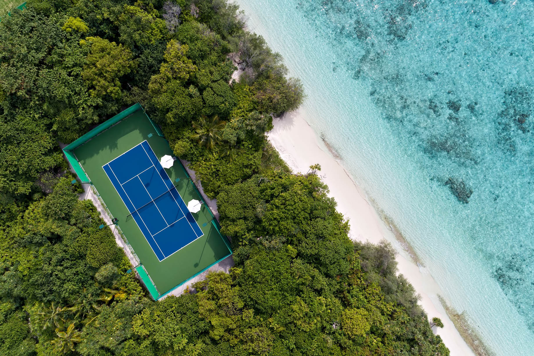 Cheval Blanc Randheli Resort – Noonu Atoll, Maldives – Tennis Court Overhead Aerial