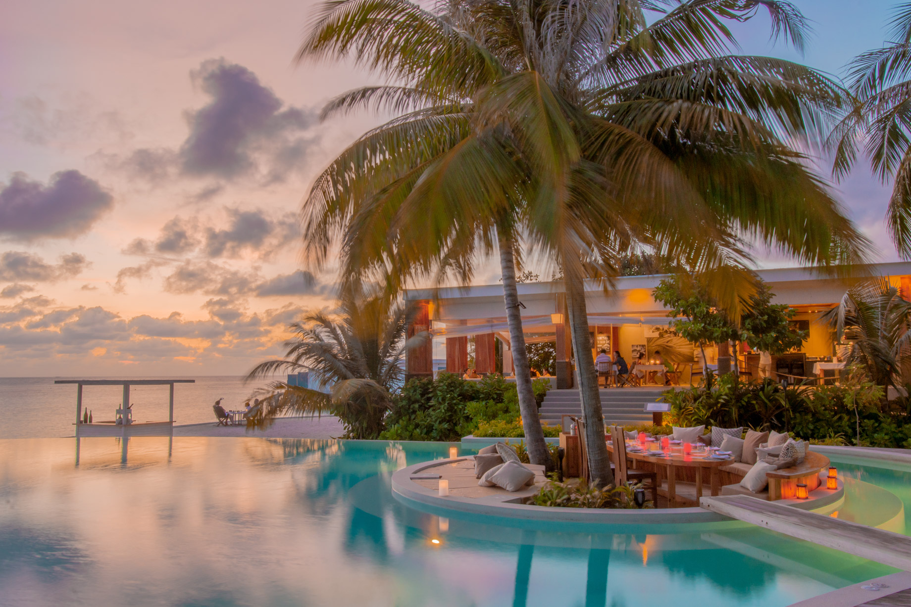 Amilla Fushi Resort and Residences – Baa Atoll, Maldives – Pool Island Dinner Sunset