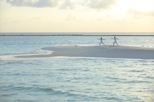 Soneva Jani Resort - Noonu Atoll, Medhufaru, Maldives - Beach Yoga Sunset
