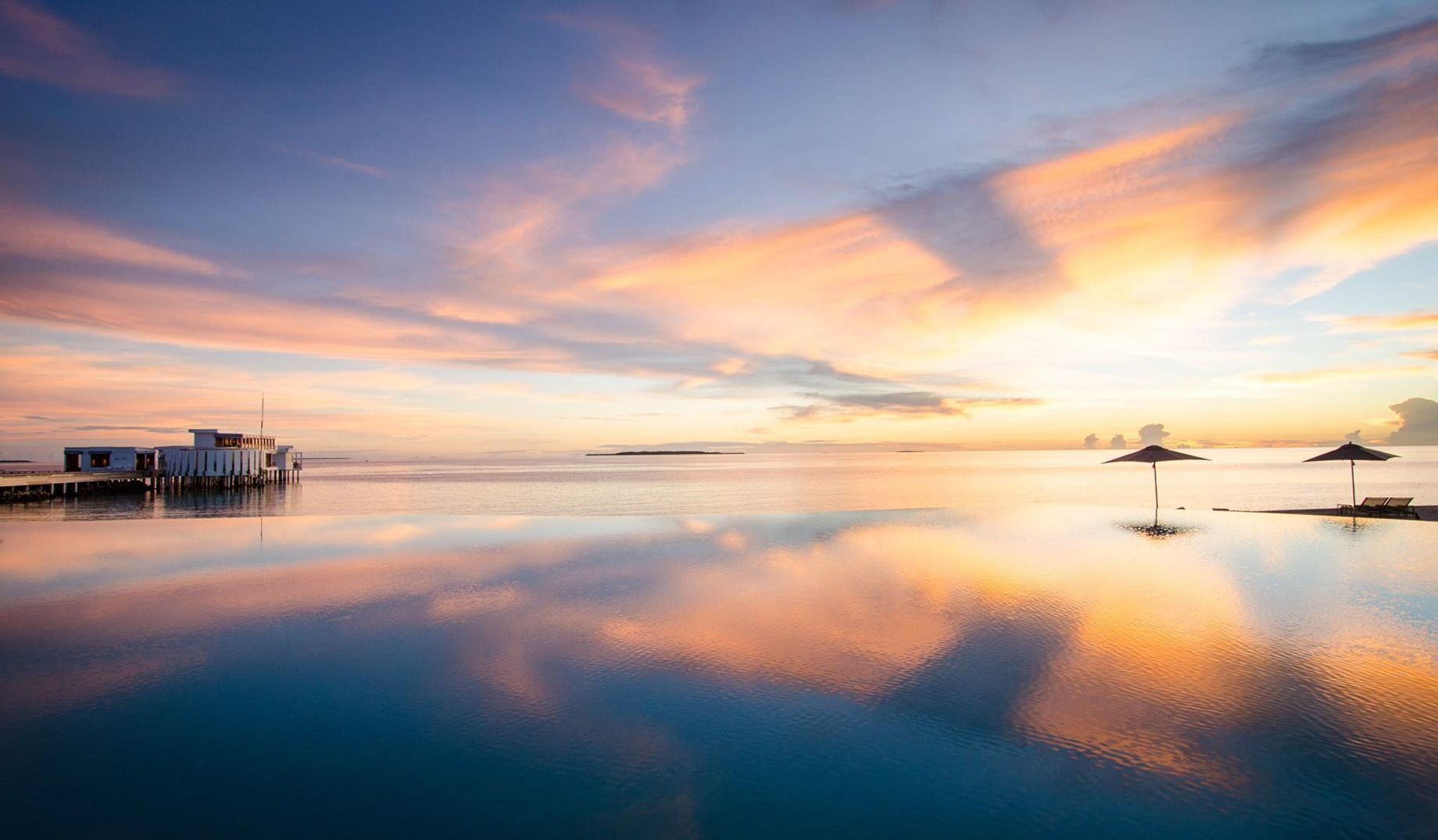 Amilla Fushi Resort and Residences – Baa Atoll, Maldives – Pool Reflections Sunset