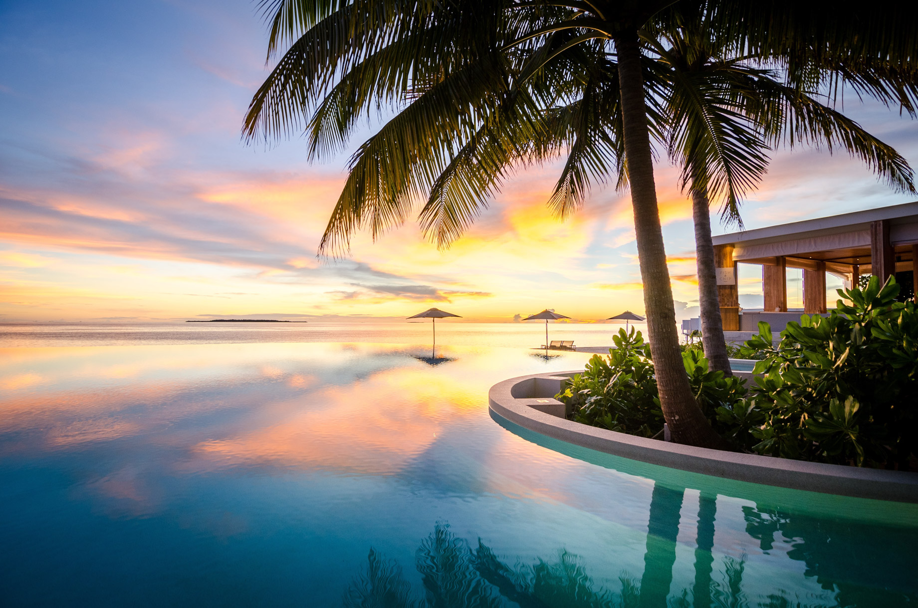 Amilla Fushi Resort and Residences - Baa Atoll, Maldives - Pool Reflections Sunset