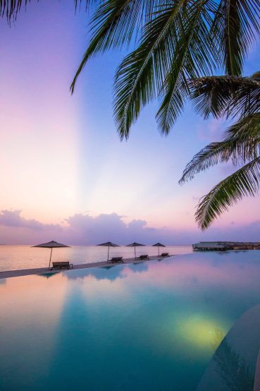 Amilla Fushi Resort and Residences - Baa Atoll, Maldives - Pool Reflections Sunset