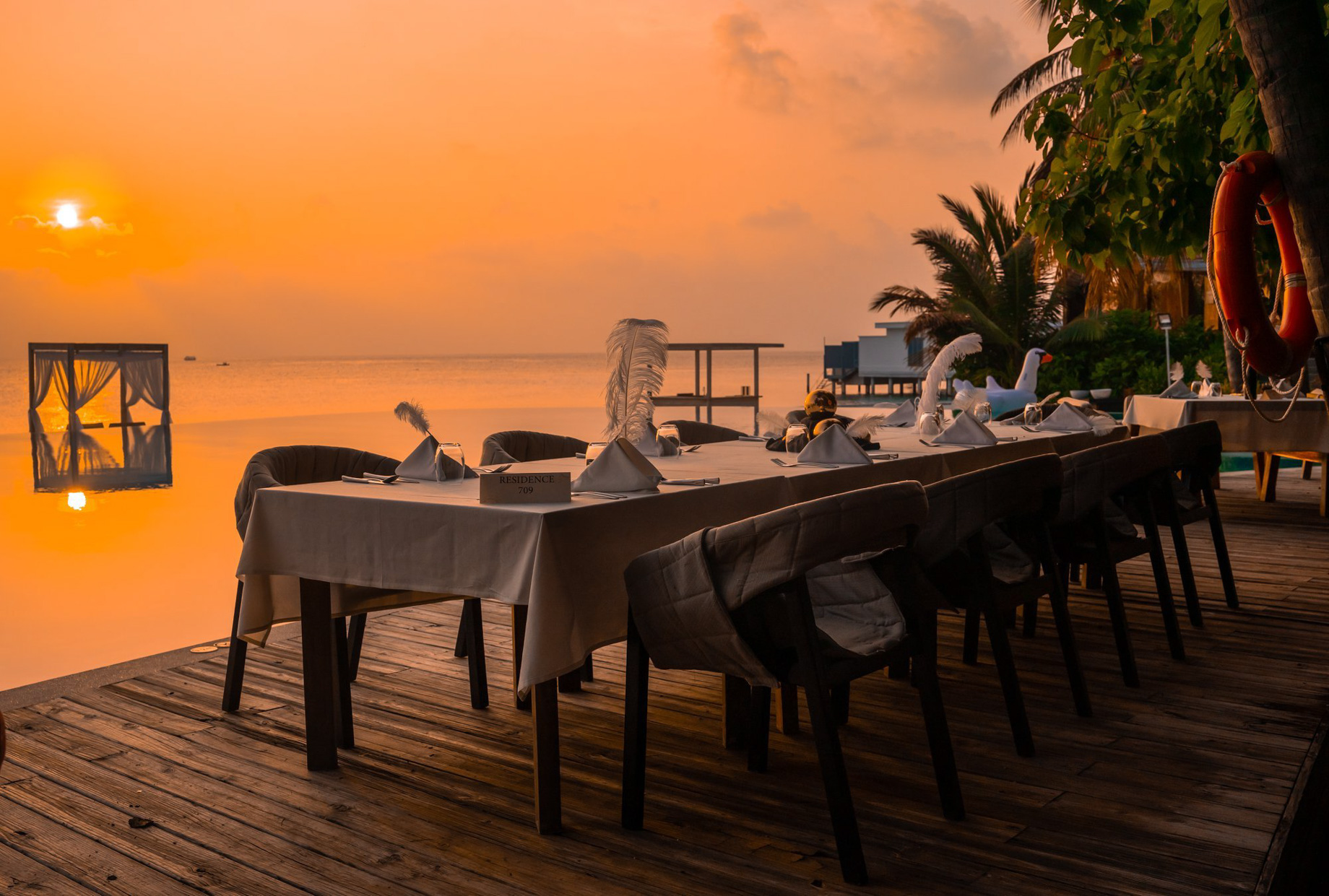 Amilla Fushi Resort and Residences – Baa Atoll, Maldives – Poolside Dining Sunset