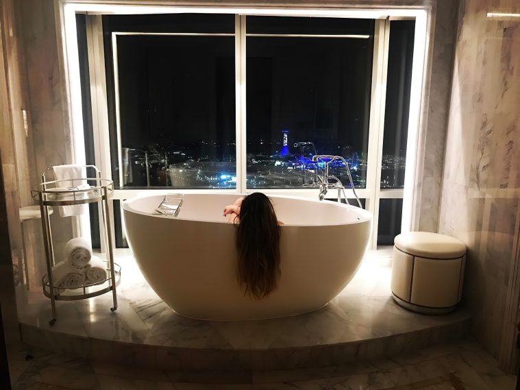 The St. Regis Abu Dhabi Hotel - Abu Dhabi, United Arab Emirates - Master Bath Frestanding Tub Night View