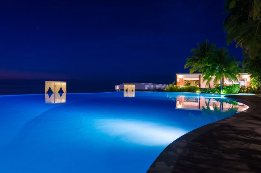 Amilla Fushi Resort and Residences - Baa Atoll, Maldives - Beachfront Infinity Pool Night