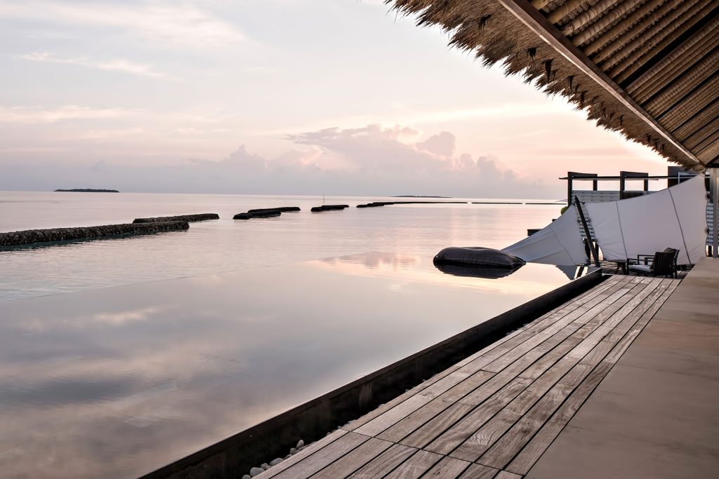 Cheval Blanc Randheli Resort - Noonu Atoll, Maldives - Overwater Infinity Pool Sunset