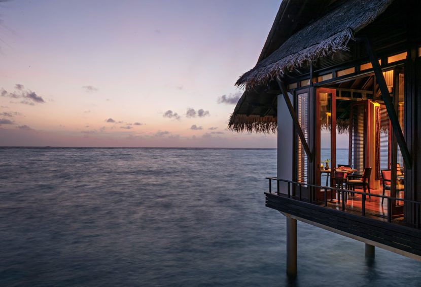 One&Only Reethi Rah Resort - North Male Atoll, Maldives - Tapasake Restaurant Oceanview Tables Dusk