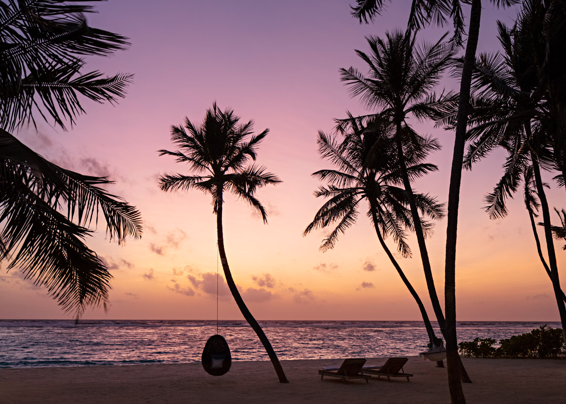 One&Only Reethi Rah Resort - North Male Atoll, Maldives - Beach Lounge Chairs Sunset
