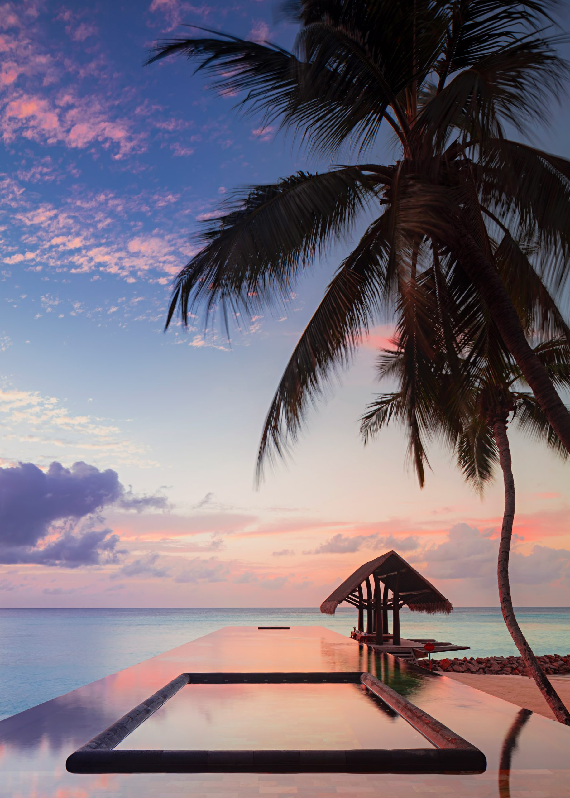 One&Only Reethi Rah Resort – North Male Atoll, Maldives – Overwater Infinity Edge Lap Pool Sunset
