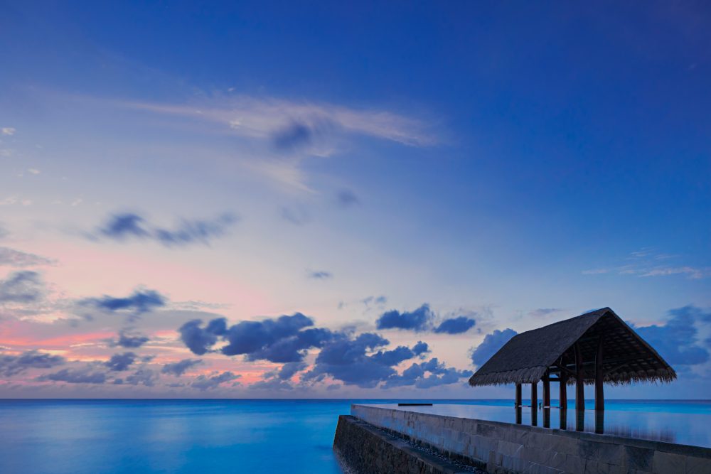 One&Only Reethi Rah Resort - North Male Atoll, Maldives - Overwater Lap Pool Sunset