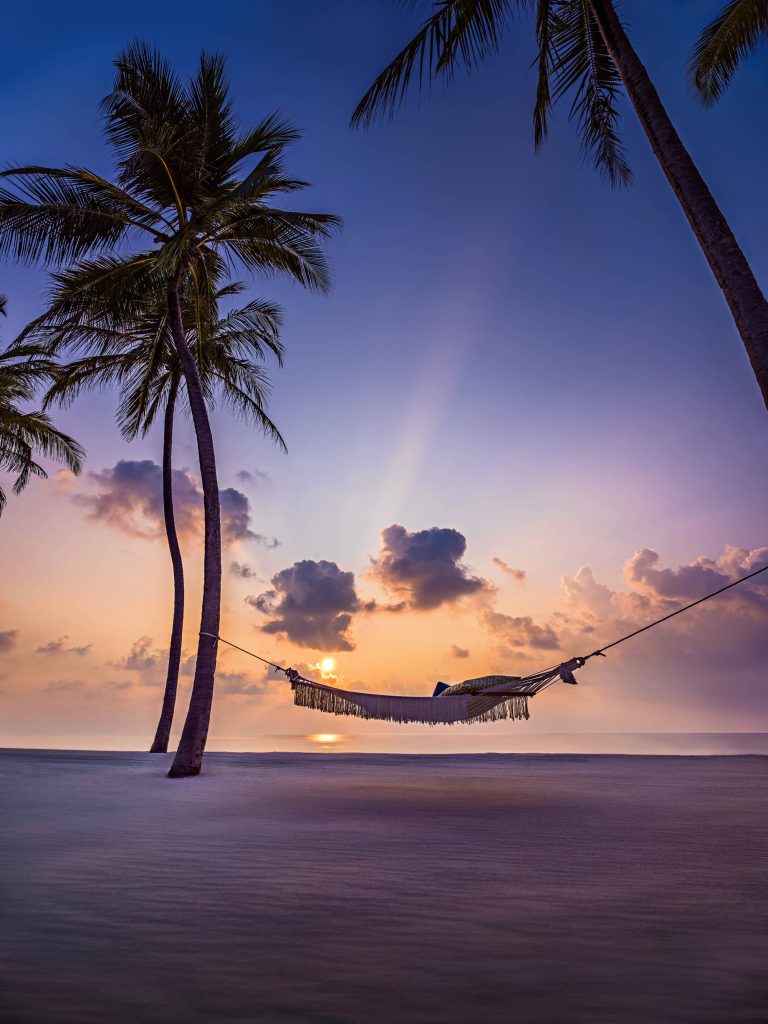 One&Only Reethi Rah Resort - North Male Atoll, Maldives - Palm Tree Hammock Beach Sunset