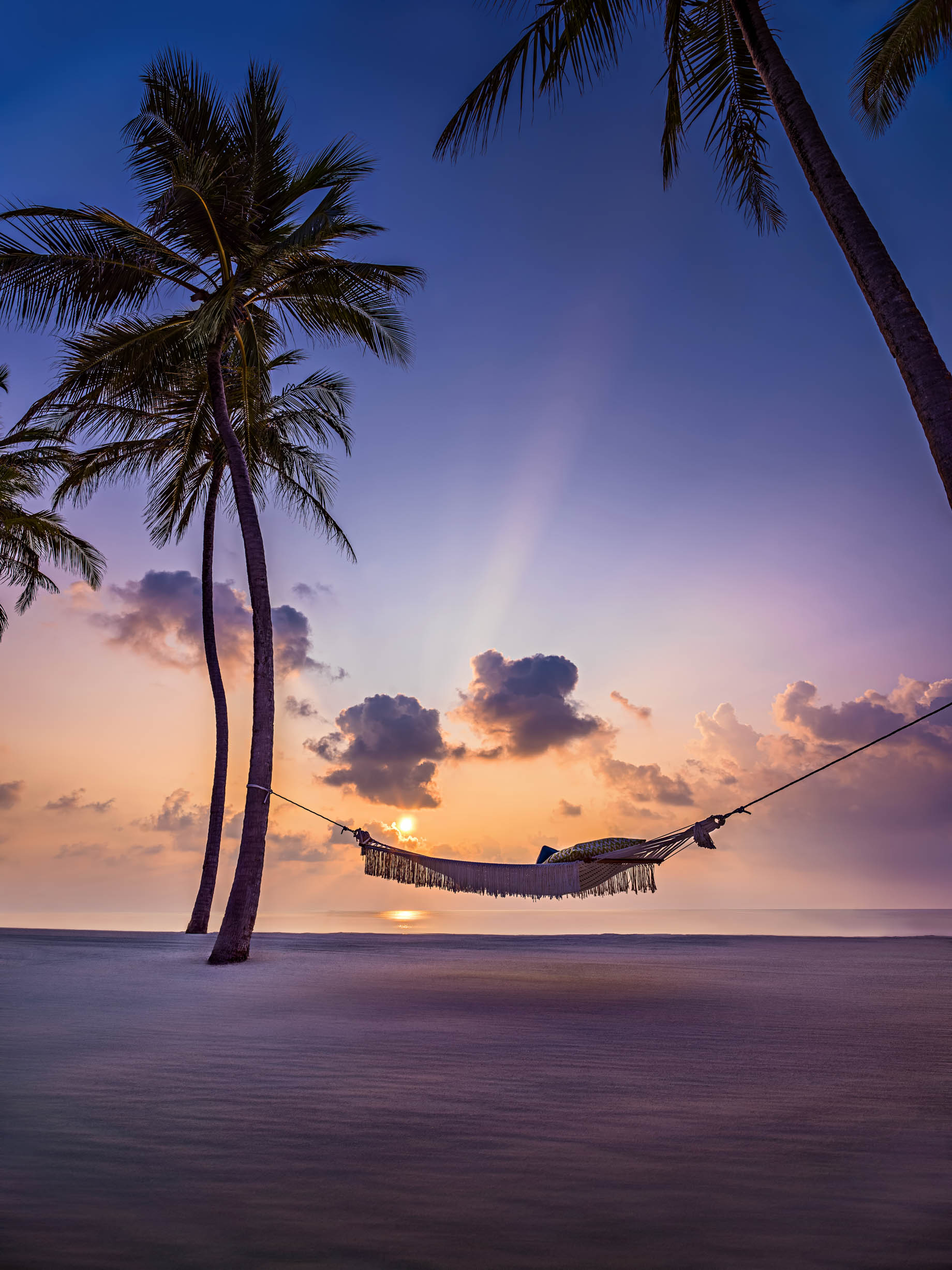 One&Only Reethi Rah Resort – North Male Atoll, Maldives – Palm Tree Hammock Beach Sunset