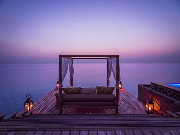 One&Only Reethi Rah Resort - North Male Atoll, Maldives - Overwater Villa Pool Deck Lounge Sunset