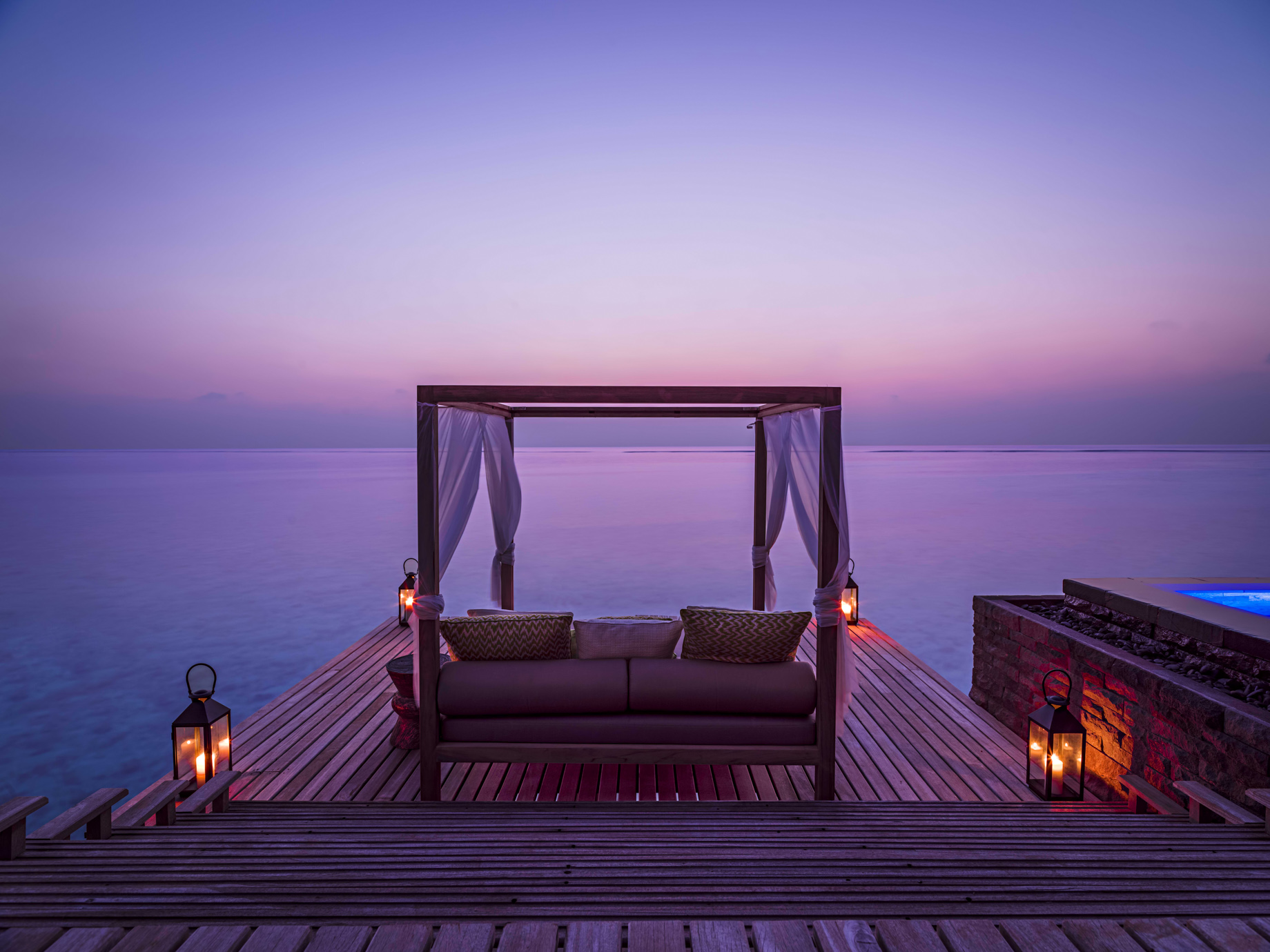One&Only Reethi Rah Resort – North Male Atoll, Maldives – Overwater Villa Pool Deck Lounge Sunset