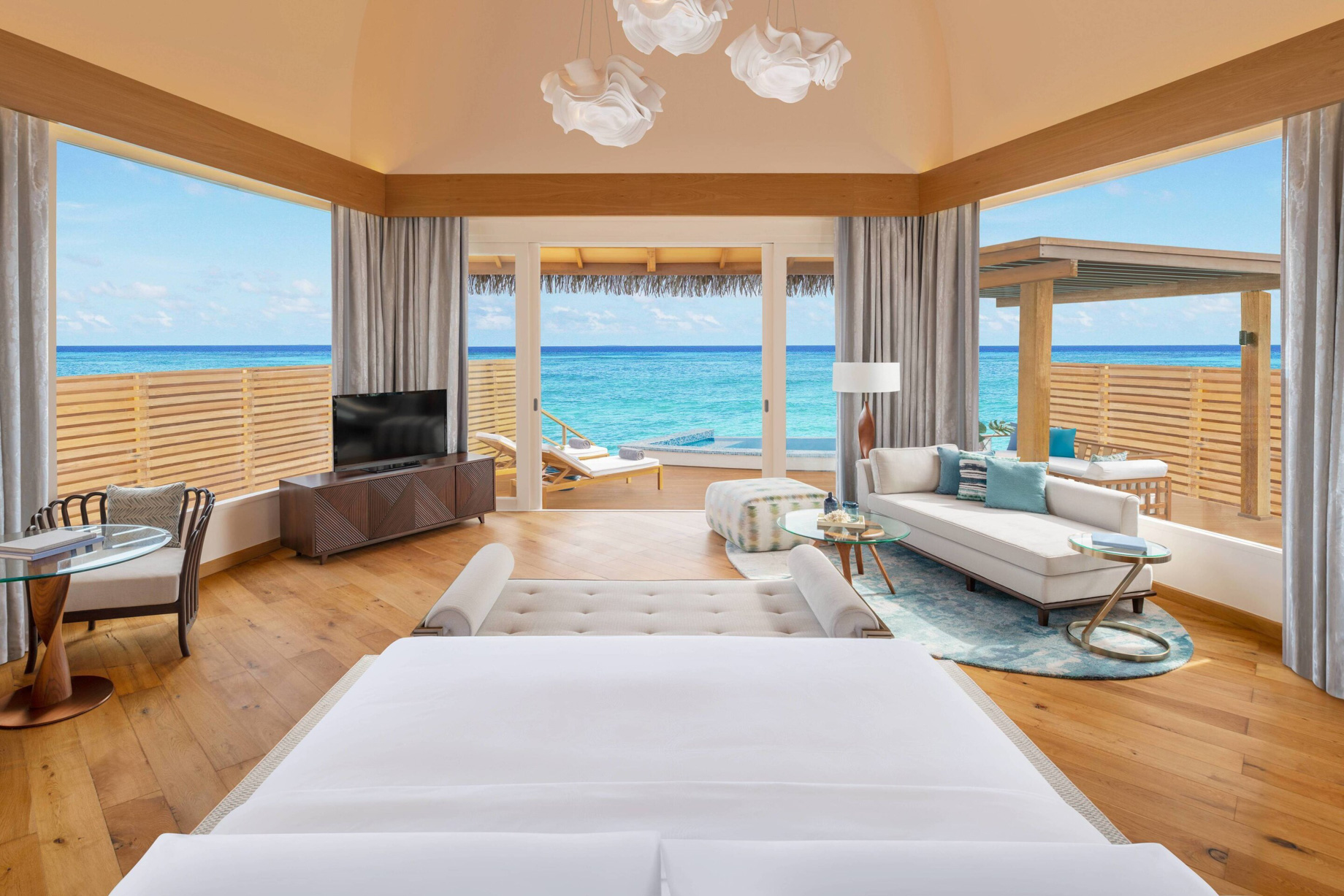 JW Marriott Maldives Resort & Spa - Shaviyani Atoll, Maldives - Overwater Pool Villa Sunset Bedroom