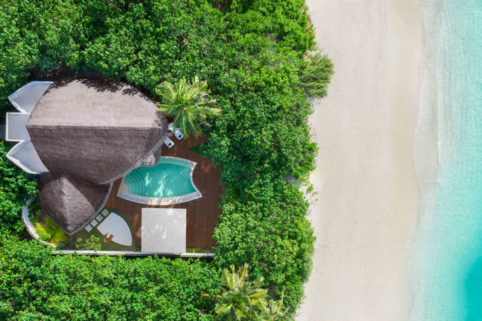 JW Marriott Maldives Resort & Spa – Shaviyani Atoll, Maldives – Beach Pool Villa Sunrise Overhead Aerial