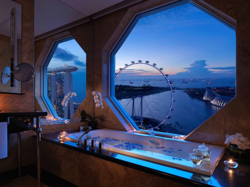 The Ritz-Carlton, Millenia Singapore Hotel - Singapore - Guest Bathroom Soaking Tub Octagonal Window Sunset View