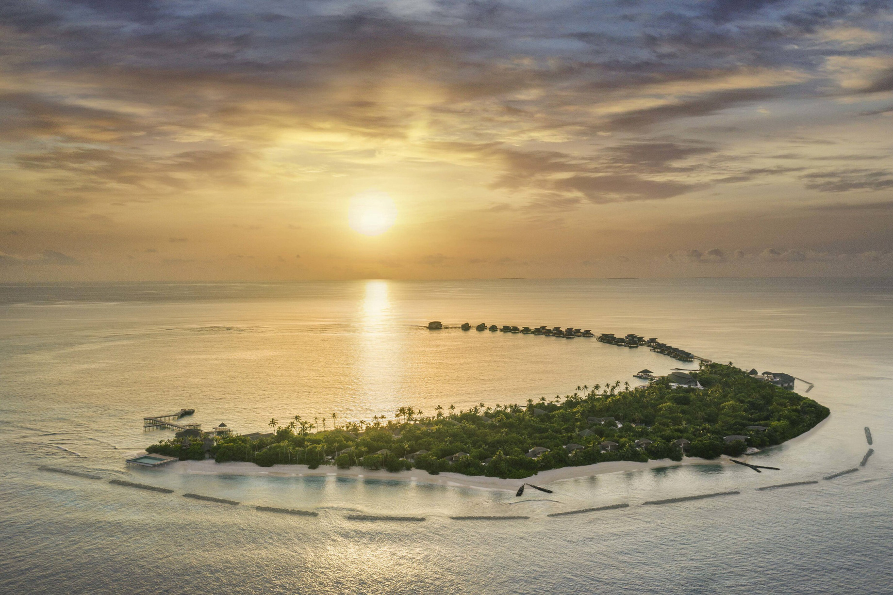 JW Marriott Maldives Resort & Spa – Shaviyani Atoll, Maldives – Resort Aerial View Sunset