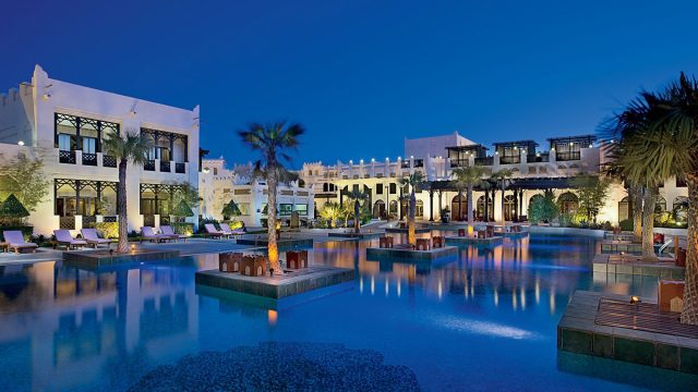 Sharq Village & Spa, A Ritz-Carlton Hotel - Doha, Qatar - Exterior Pool Night View