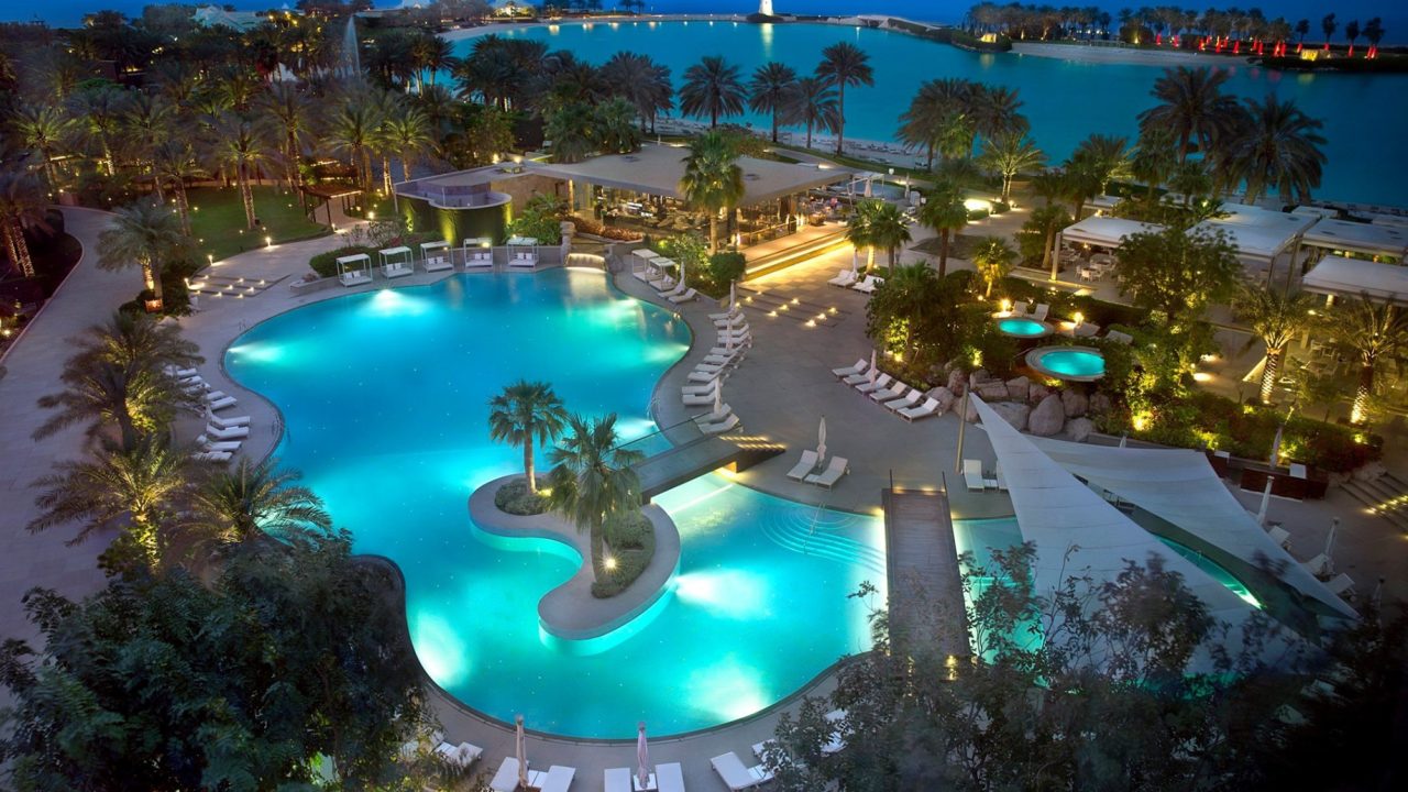 The Ritz-Carlton, Bahrain Resort Hotel - Manama, Bahrain - Outdoor Pool Aerial Night View