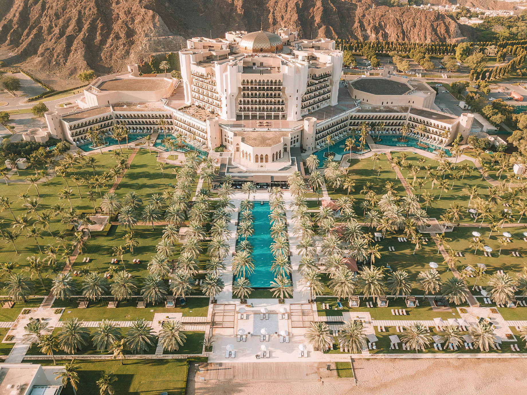 Al Bustan Palace, A Ritz-Carlton Hotel – Muscat, Oman – Hotel Exterior Aerial