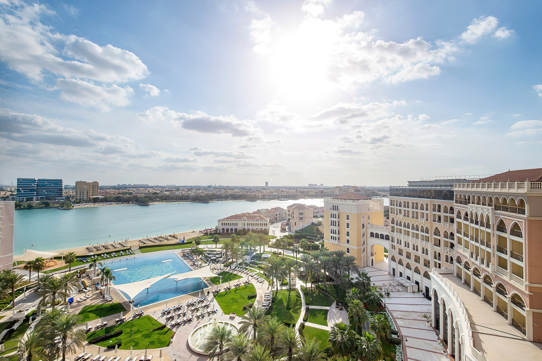 The Ritz-Carlton Abu Dhabi, Grand Canal Hotel – Abu Dhabi, UAE – Hotel Pool and Beach Aerial View