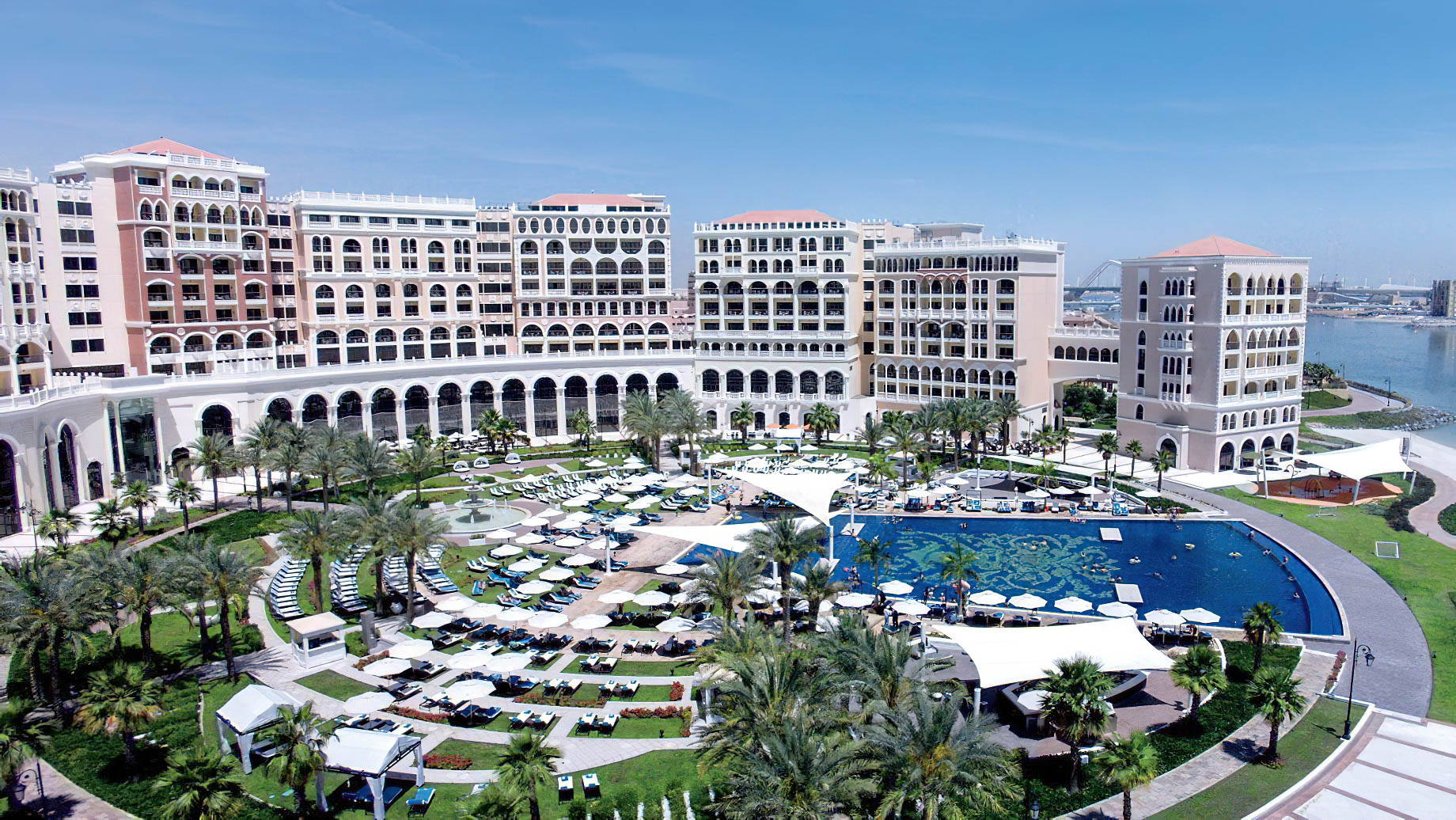 The Ritz-Carlton Abu Dhabi, Grand Canal Hotel – Abu Dhabi, UAE – Pool Aerial View