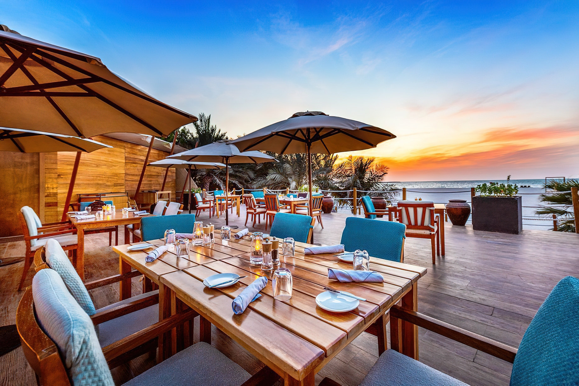 The Ritz-Carlton Ras Al Khaimah, Al Hamra Beach Hotel - UAE - Shore House Restaurant Patio Sunset