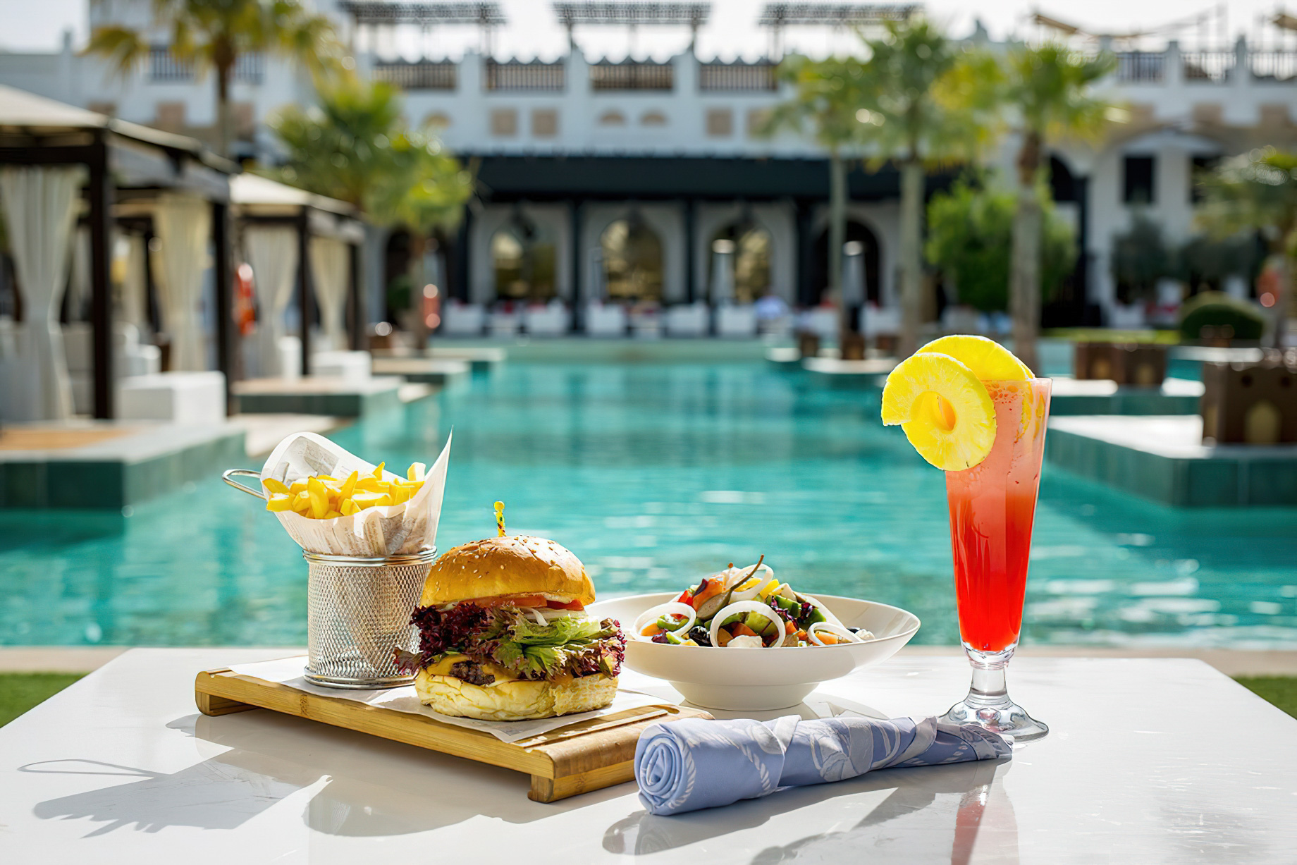 Sharq Village & Spa, A Ritz-Carlton Hotel – Doha, Qatar – Outdoor Pool Deck Dining