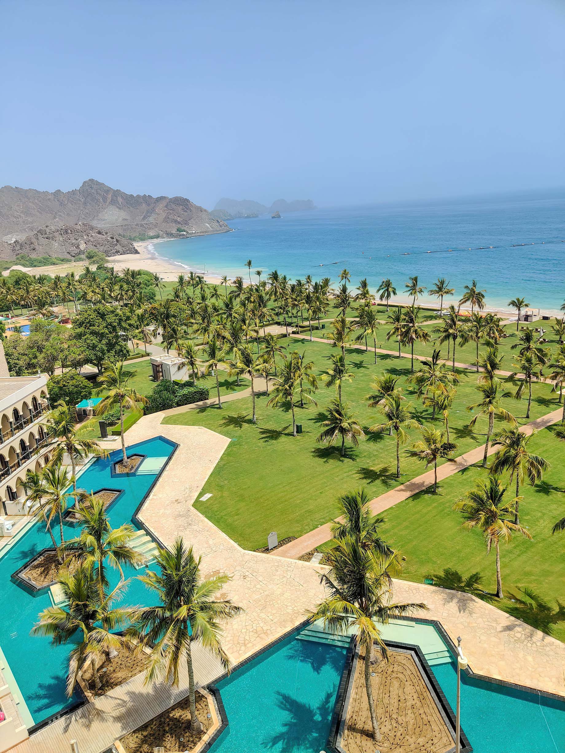 Al Bustan Palace, A Ritz-Carlton Hotel – Muscat, Oman – Hotel Pool Aerial View
