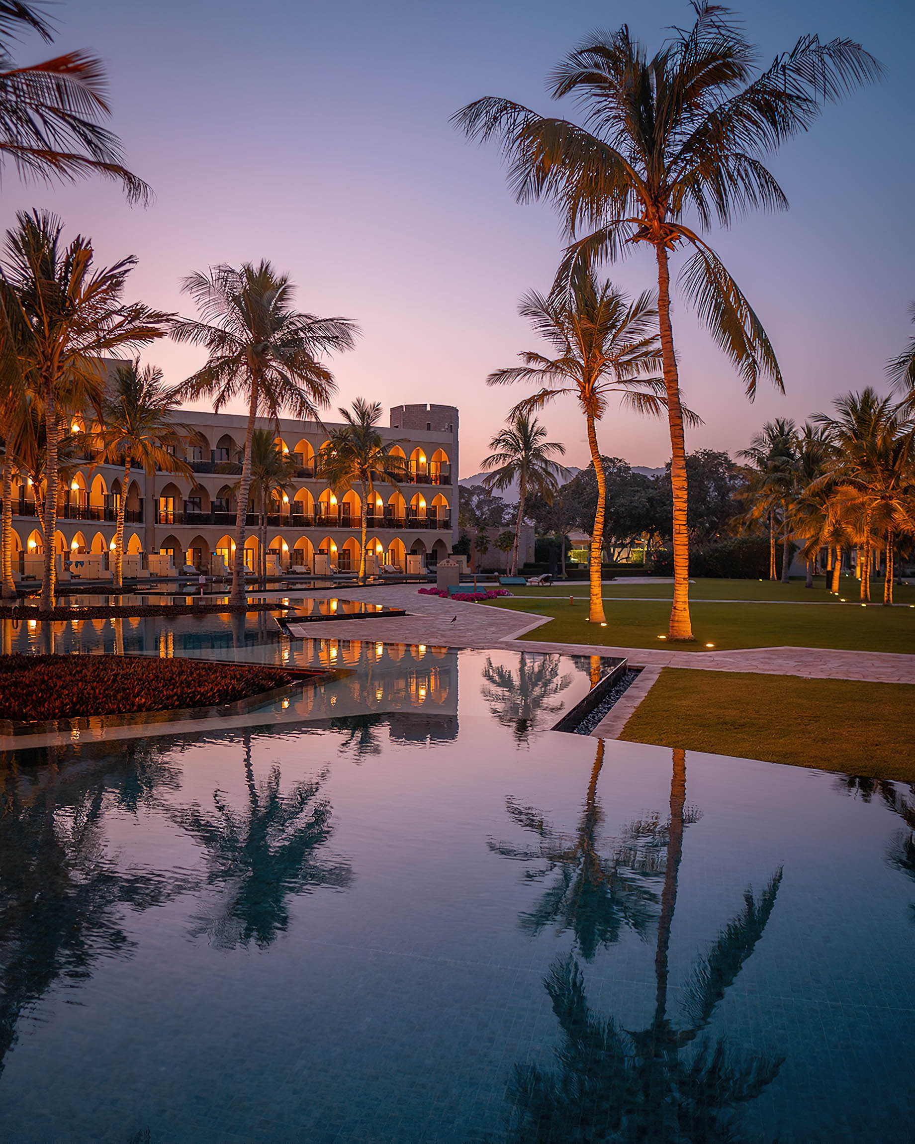 Al Bustan Palace, A Ritz-Carlton Hotel – Muscat, Oman – Hotel Pool View Evening