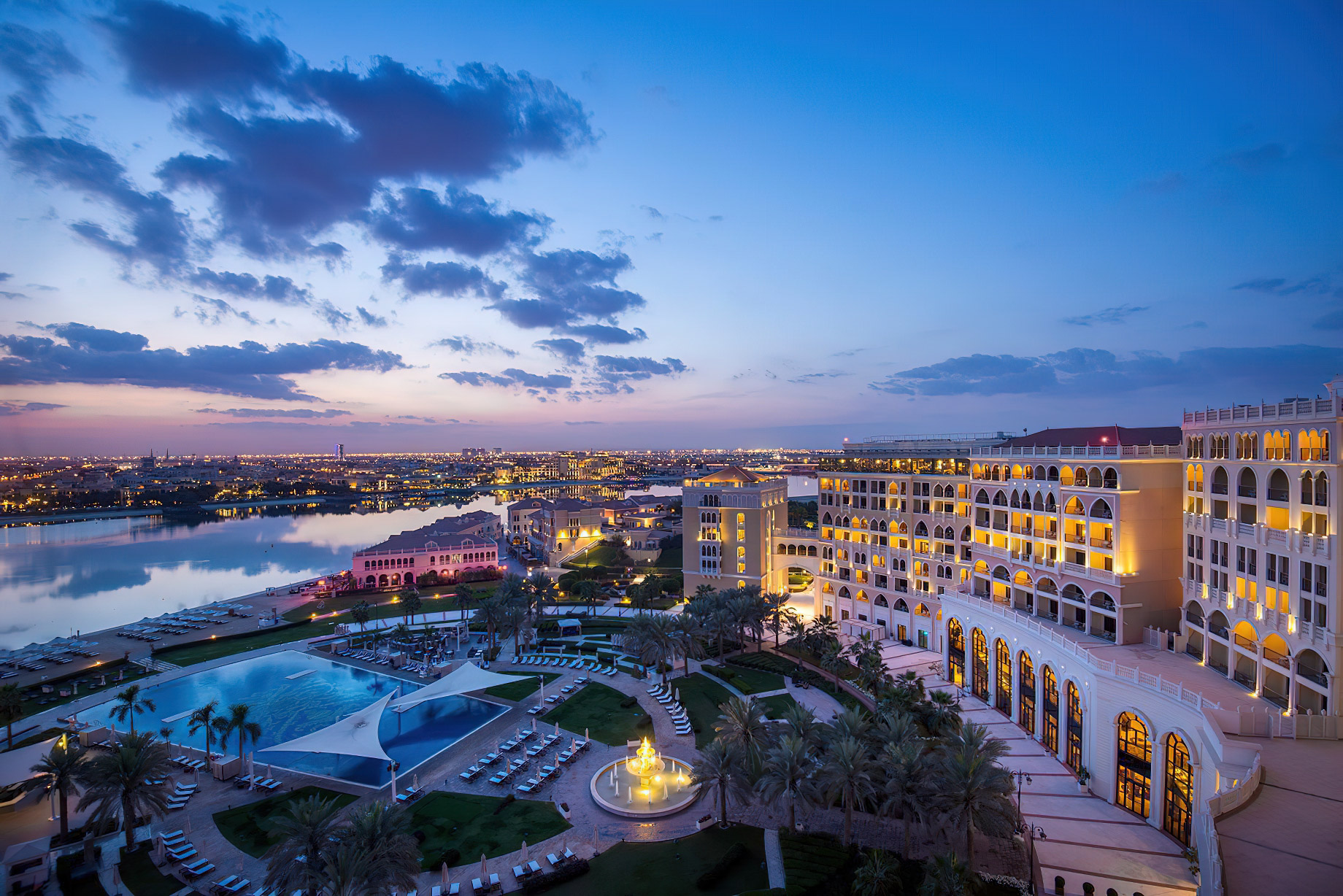 The Ritz-Carlton Abu Dhabi, Grand Canal Hotel – Abu Dhabi, UAE – Hotel Exterior Night Pool View