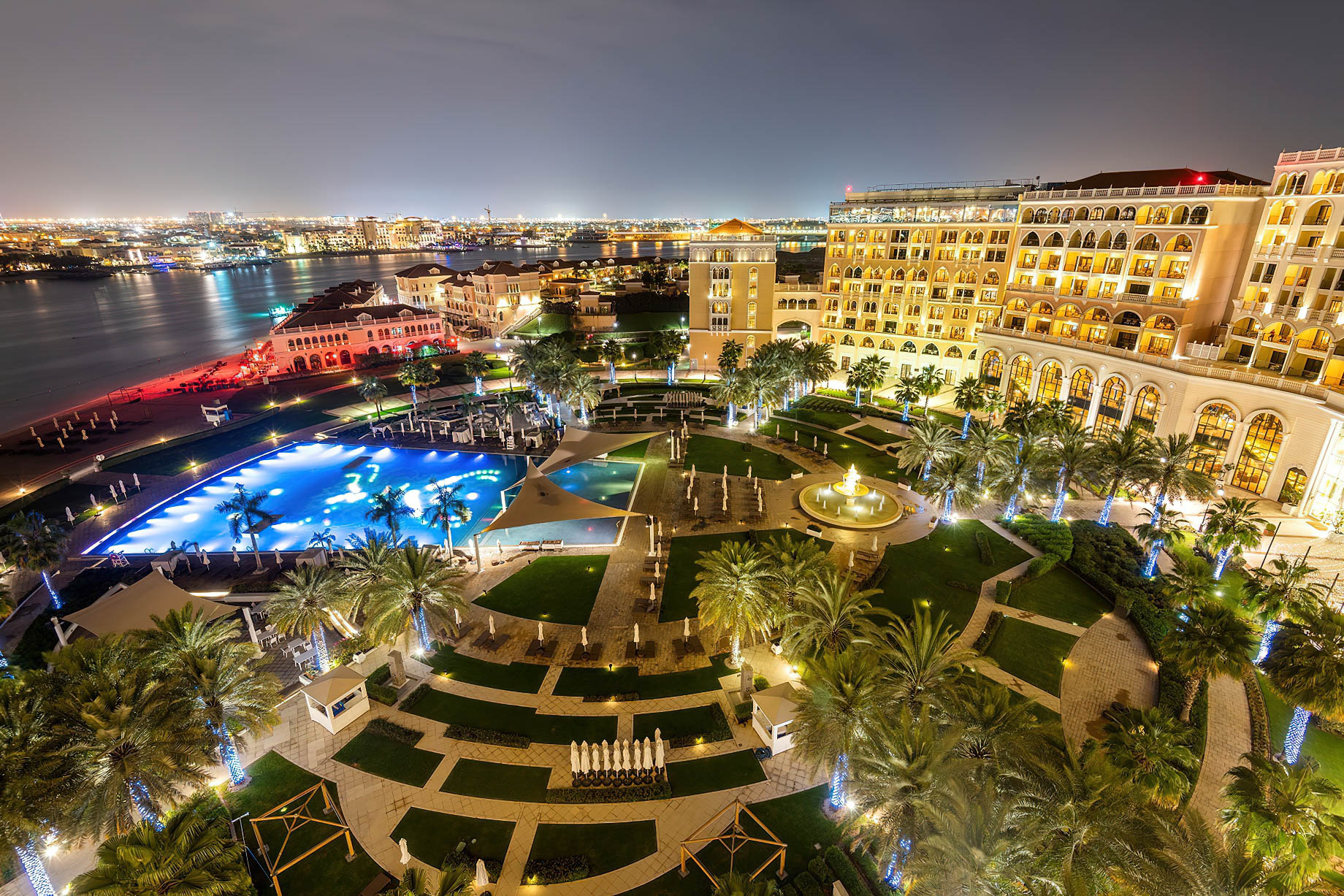 The Ritz-Carlton Abu Dhabi, Grand Canal Hotel – Abu Dhabi, UAE – Hotel Exterior Night Pool View