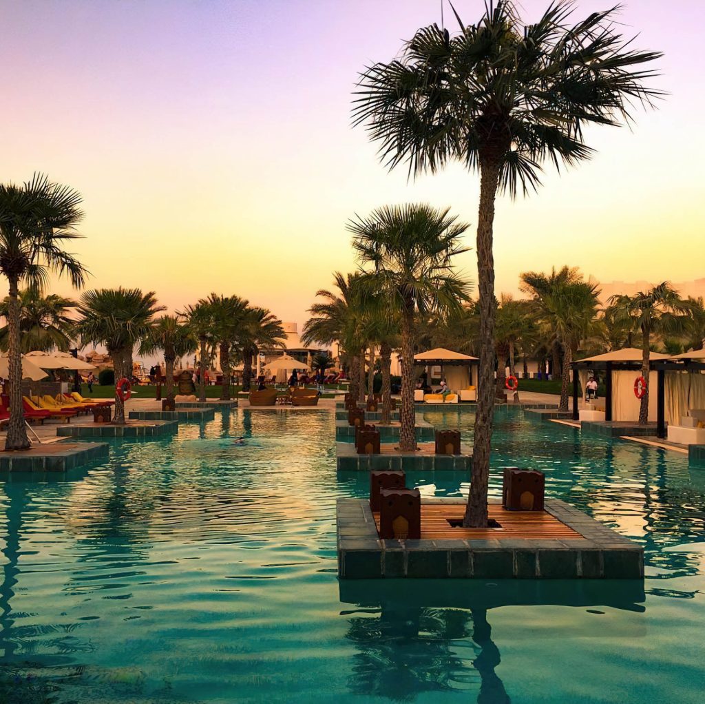 Sharq Village & Spa, A Ritz-Carlton Hotel – Doha, Qatar – Exterior Pool Sunset