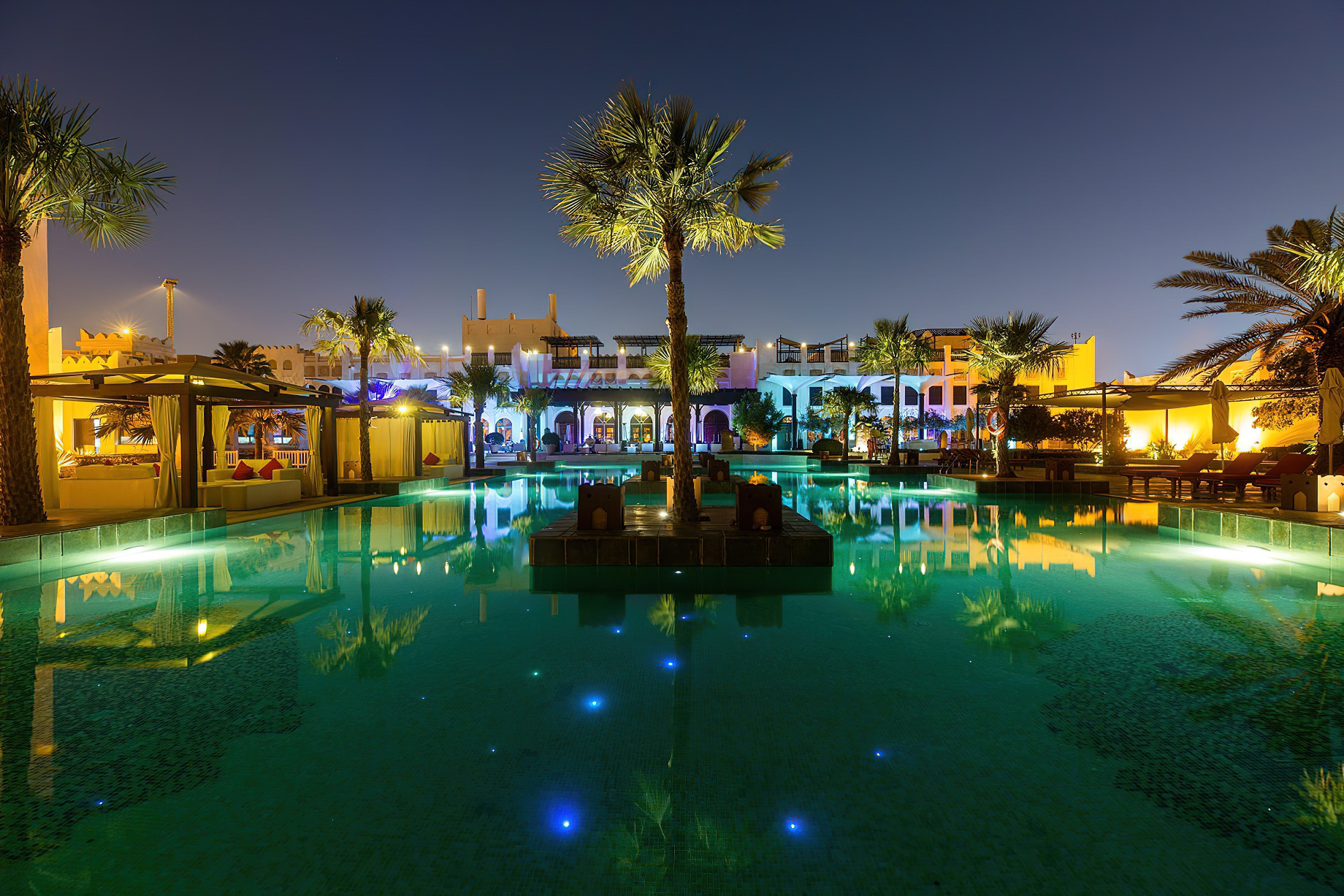 Sharq Village & Spa, A Ritz-Carlton Hotel – Doha, Qatar – Exterior Pool Night