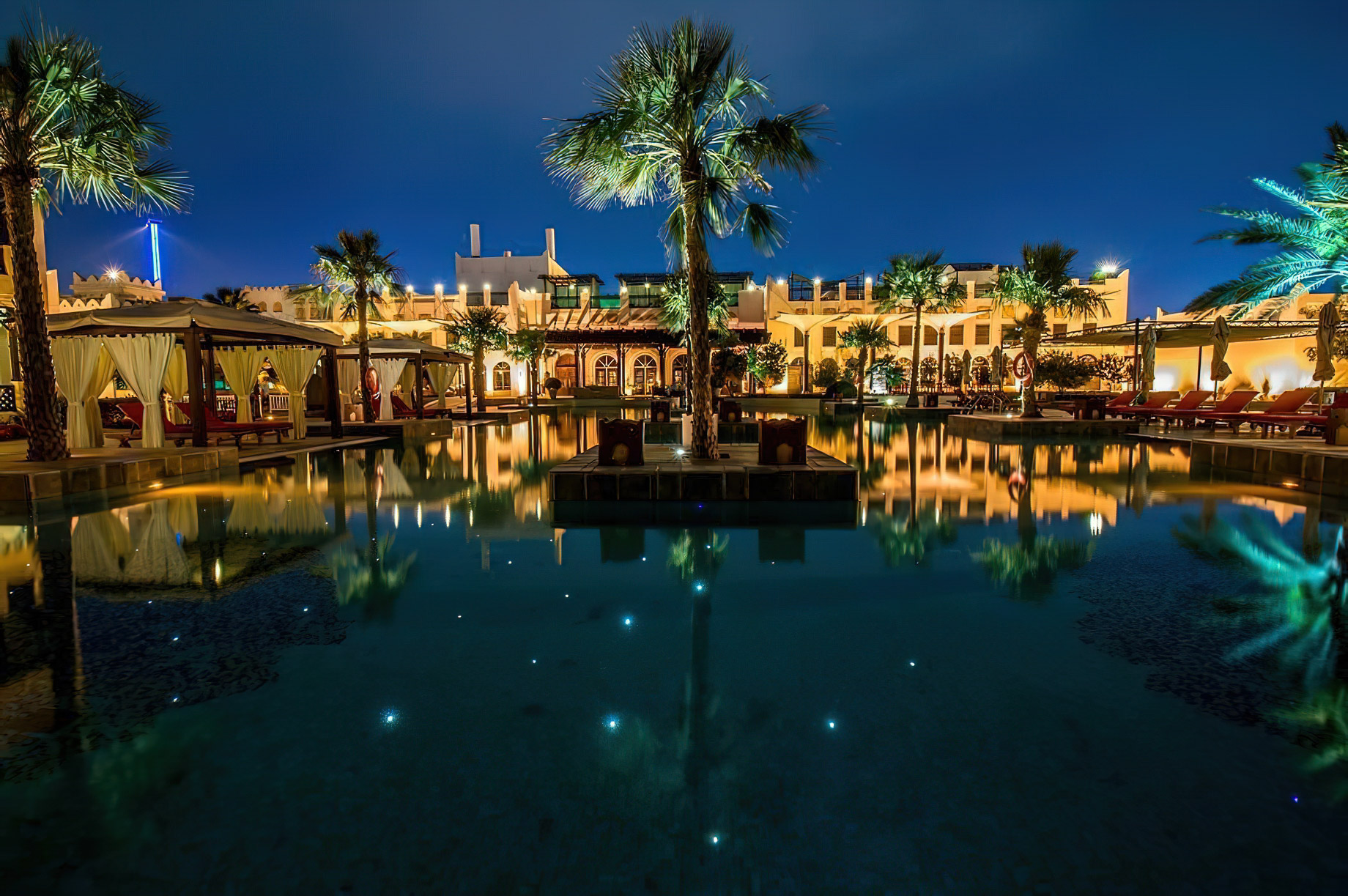 Sharq Village & Spa, A Ritz-Carlton Hotel – Doha, Qatar – Exterior Pool Night