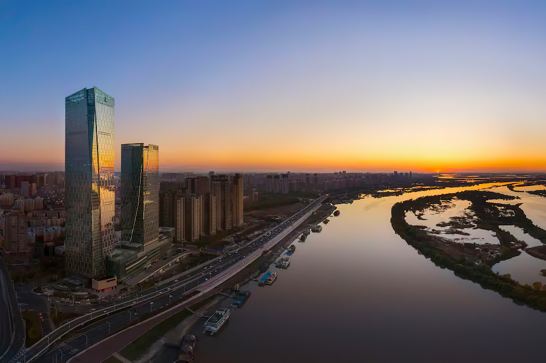 The Ritz-Carlton, Harbin Hotel – Harbin, China – Night Aerial River View