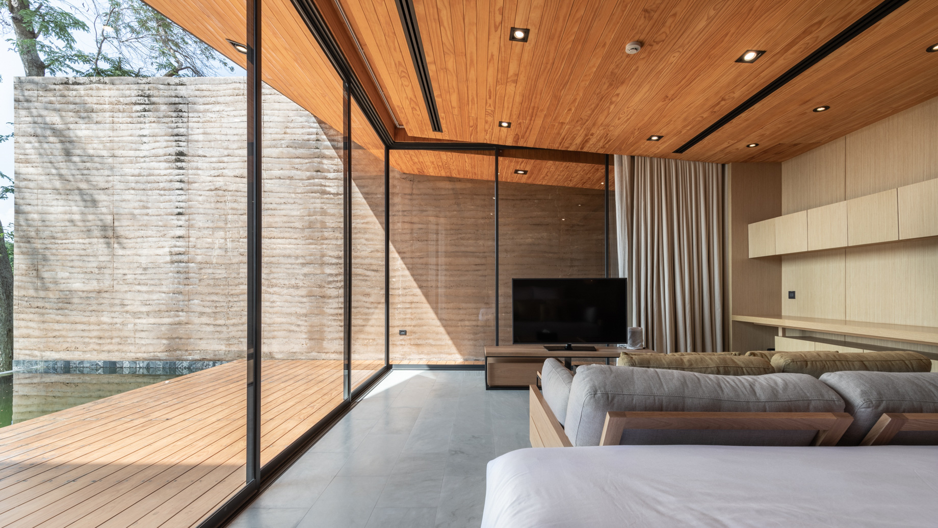 Tara Villa Riverkwai Resort - Kanchanaburi, Thailand - One Bedroom Pool Villa Interior Sliding Glass Walls