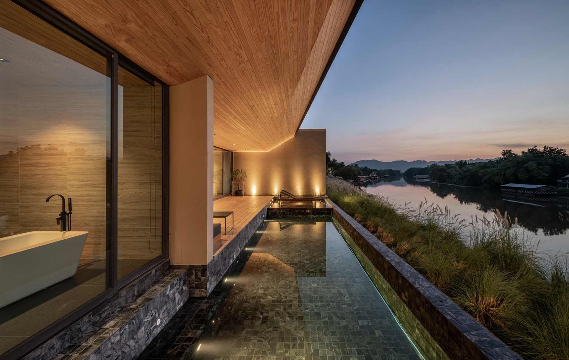 Tara Villa Riverkwai Resort – Kanchanaburi, Thailand – Two Bedroom Pool Villa Exterior River View Night