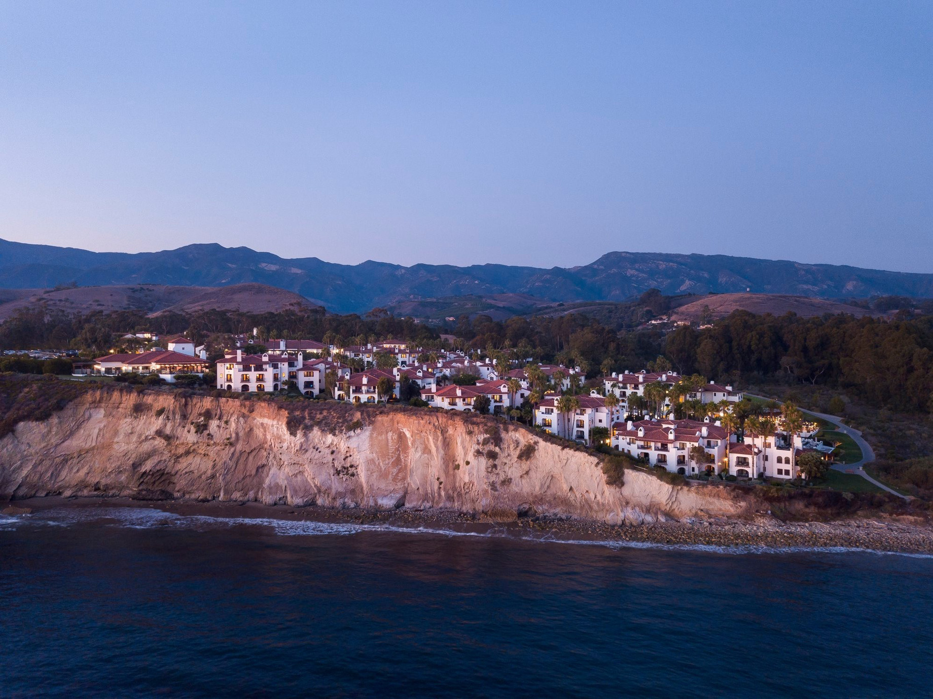 The Ritz-Carlton Bacara, Santa Barbara Resort – Santa Barbara, CA, USA – Resort Aerial Ocean Beach View Sunset