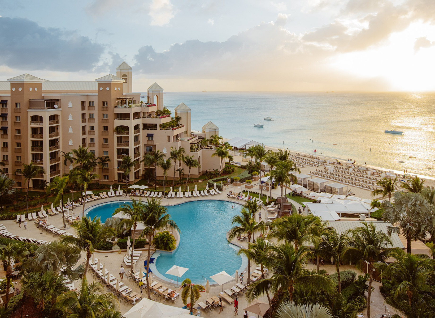 The Ritz-Carlton, Grand Cayman Resort - Seven Mile Beach, Cayman Islands - Exterior Pool Aerial Ocean View Sunset
