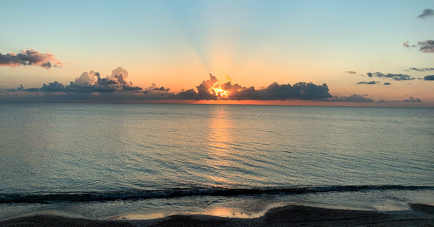 105 – The Ritz-Carlton, Grand Cayman Resort – Seven Mile Beach, Cayman Islands – Aerial Ocean View Sunset