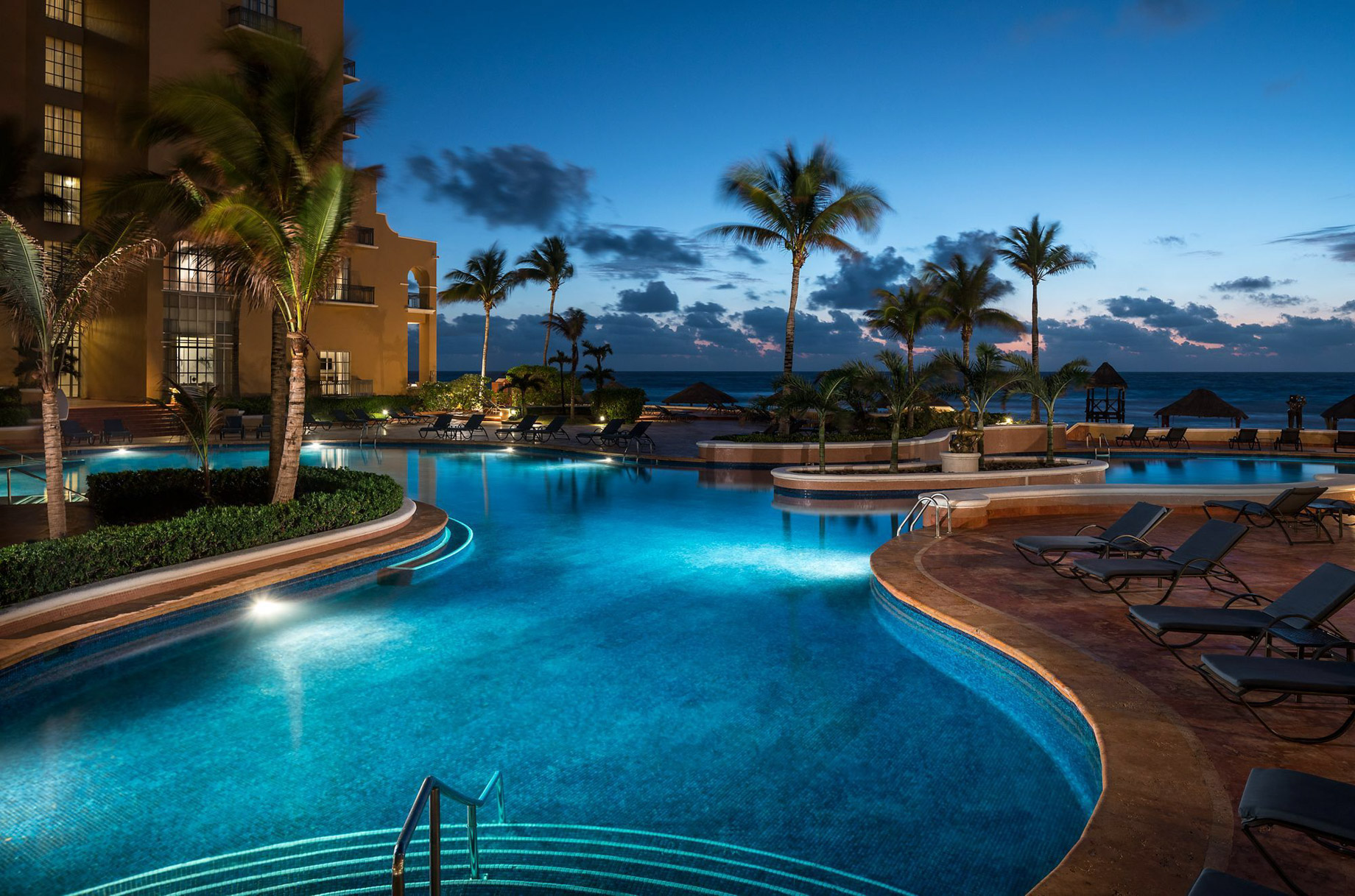 The Ritz-Carlton, Cancun Resort – Cancun, Mexico – Pool Deck Evening Ocean View