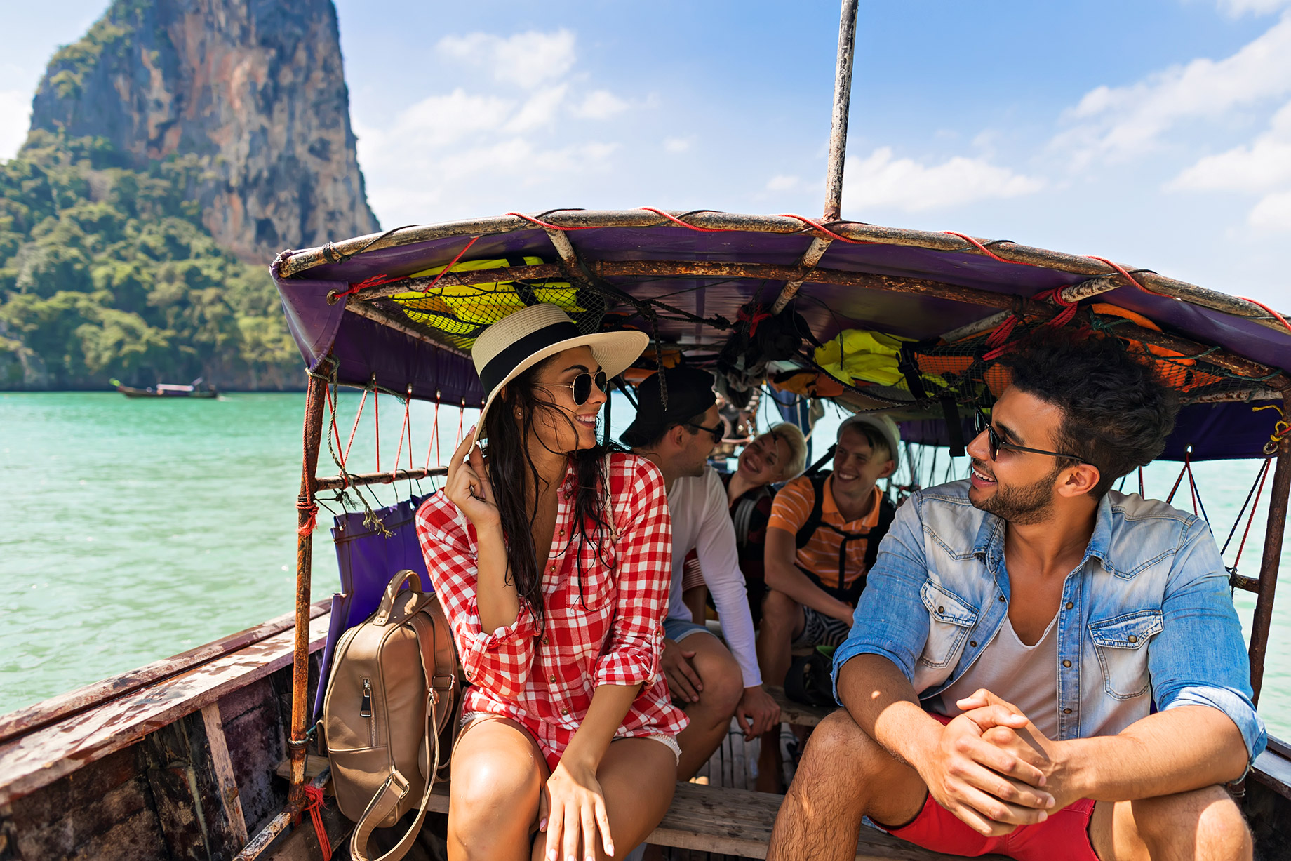 Young Group of Travellers – Tropical Holiday Vacation – Boating in Thailand