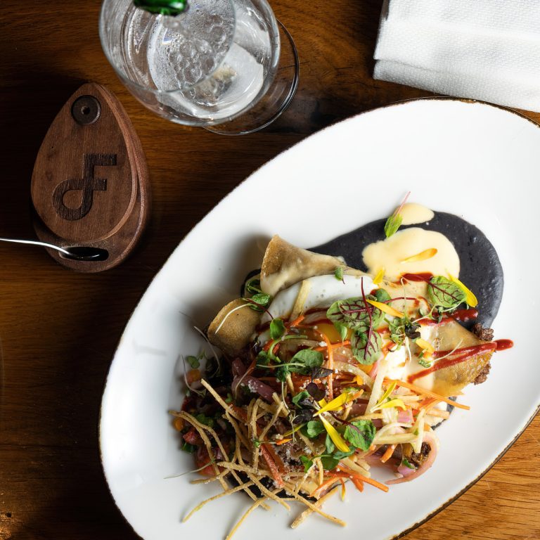 The Ritz-Carlton, Dallas Hotel – Dallas, TX, USA – Truck Stop Buffalo Enchiladas. With Basted Farm Eggs, Smoky Black Bean Puree, and Queso Fundid