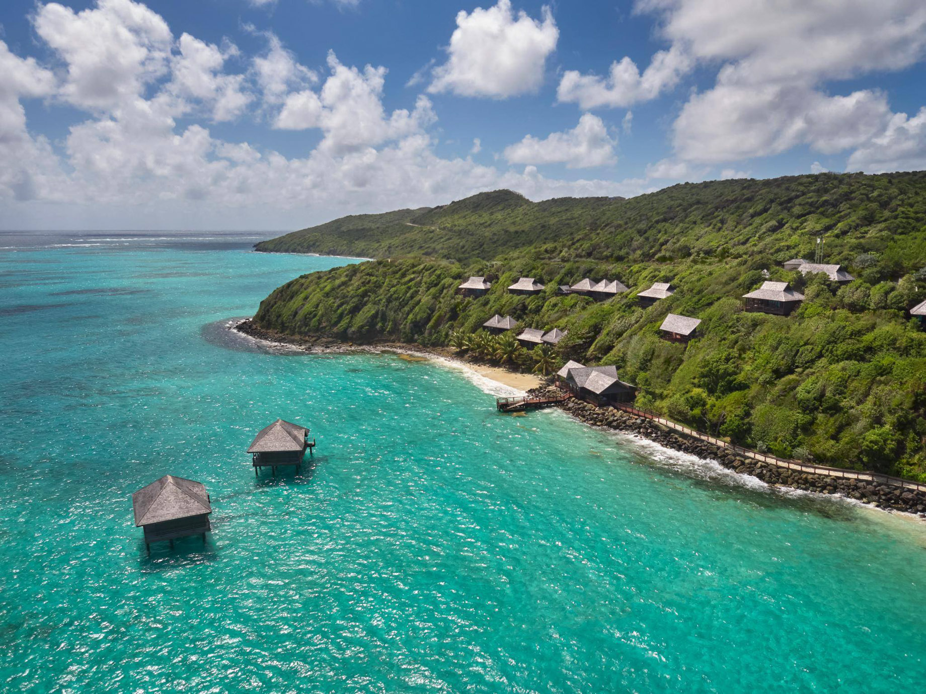 Mandarin Oriental, Canouan Island Resort – Saint Vincent and the Grenadines – Spa Exterior Overwater Bungalows Aerial View