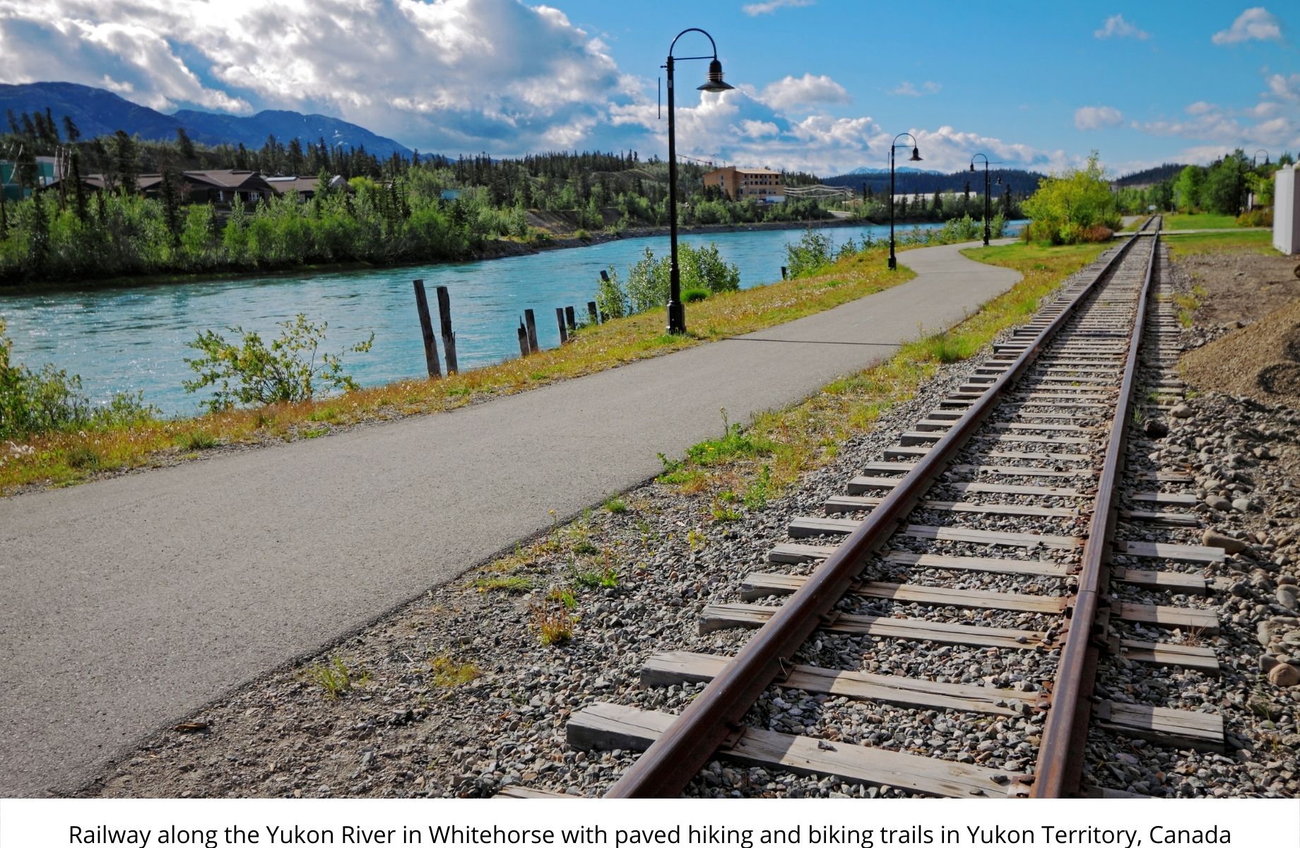 Railway along the Yukon River in Whitehorse with paved hiking and biking trails in Yukon Territorv, Canada
